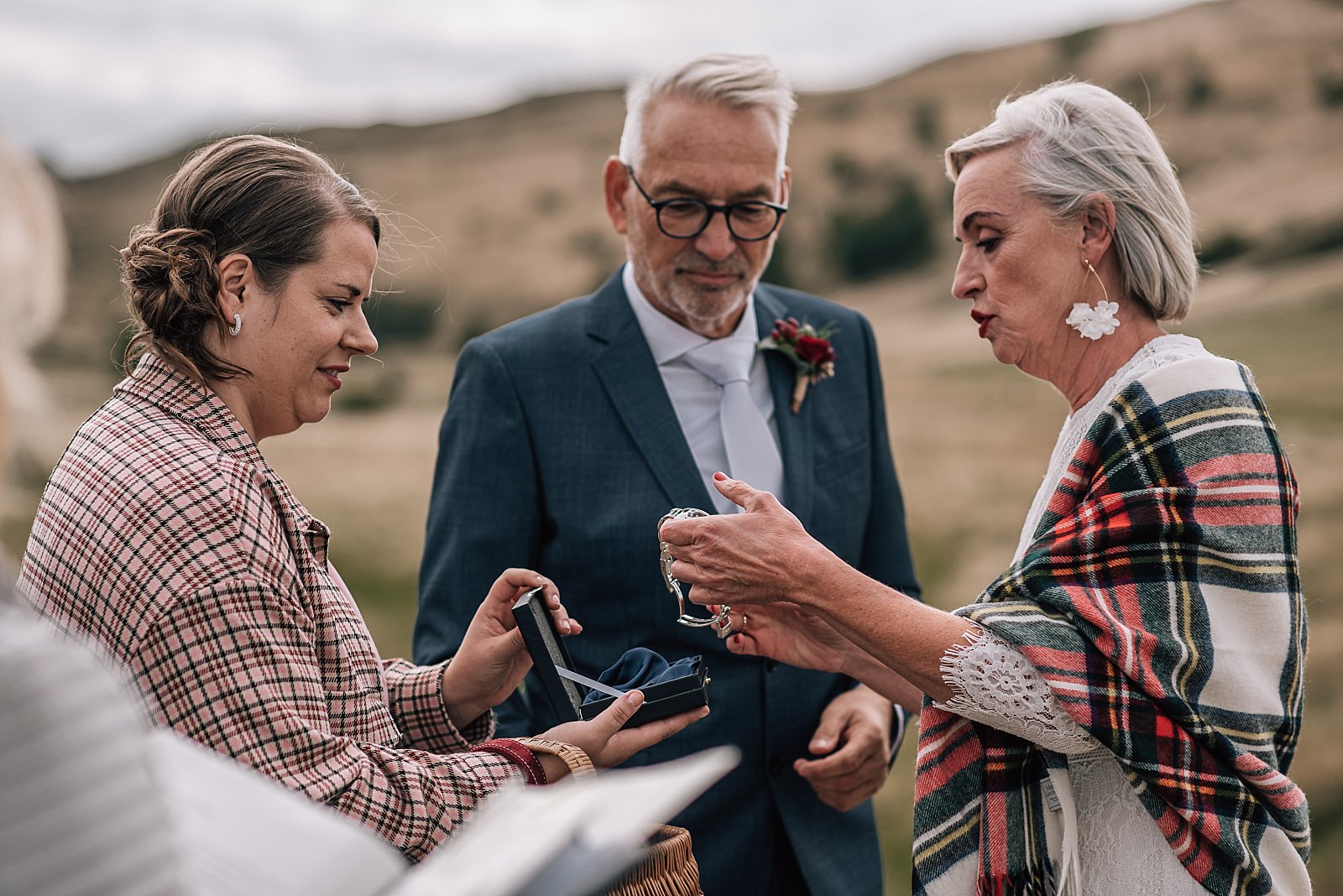 bride gives groom watch instead of ring during their elopement in edinburgh scotland
