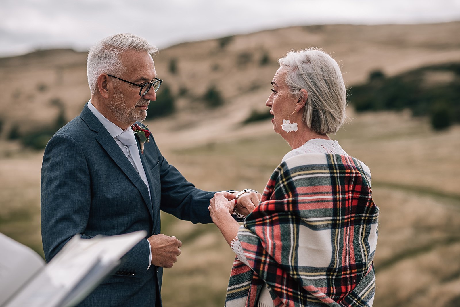 bride gives groom watch instead of ring during their elopement in edinburgh scotland