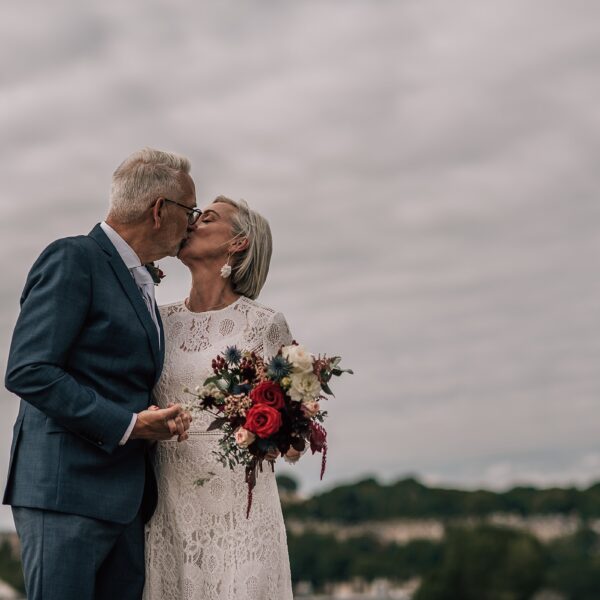 older bride and groom kiss on their wedding day by edinburgh elopement photographer scotland