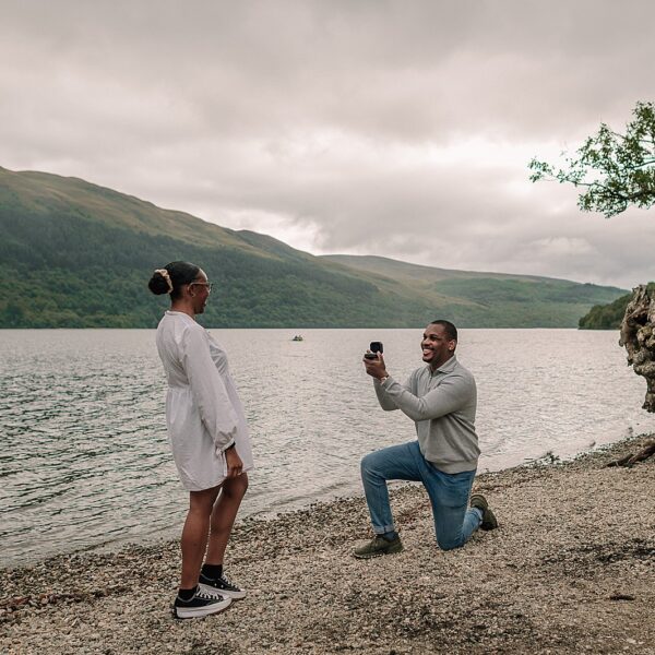 Scottish surprise proposal at firkin point Loch Lomond on the shore captured by proposal photographer scotland