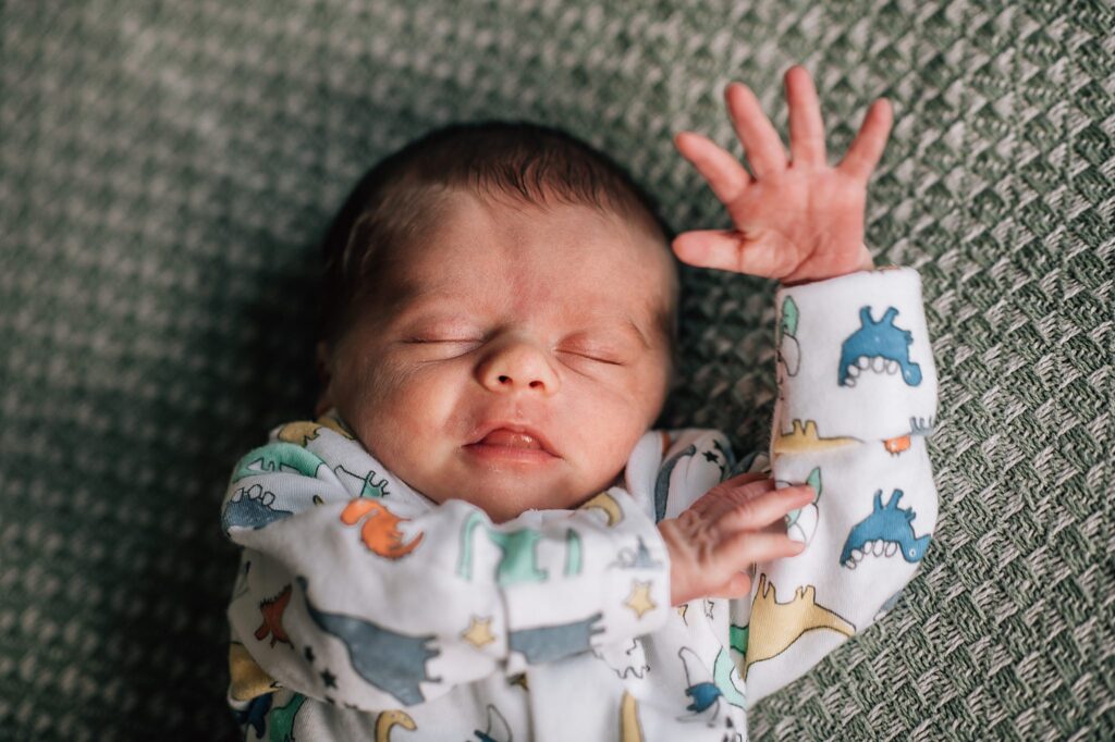 sleeping baby with fingers splayed